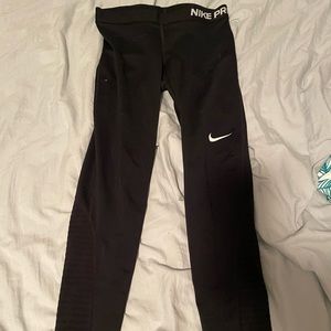 nike pro leggings black with mesh details.